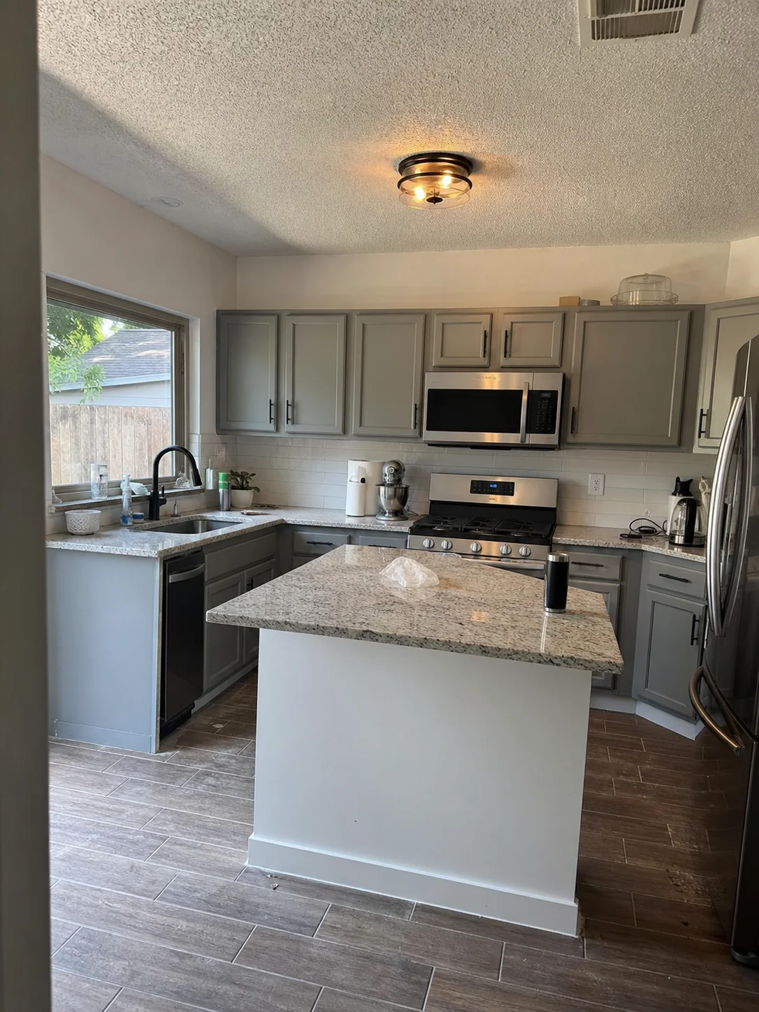 Modest Dallas kitchen refreshed without changing its main footprint