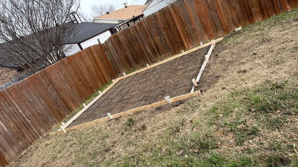 Patio perimeter forms set to plan slope and water flow